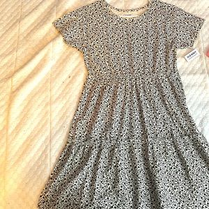 I’m selling this dress because I will never wear it, but it is a nice dress.